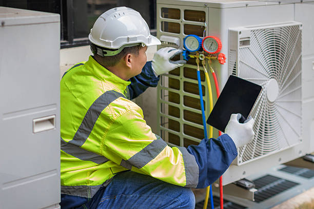 Professional Air Conditioning Repair technician working in Flat Rock, MI